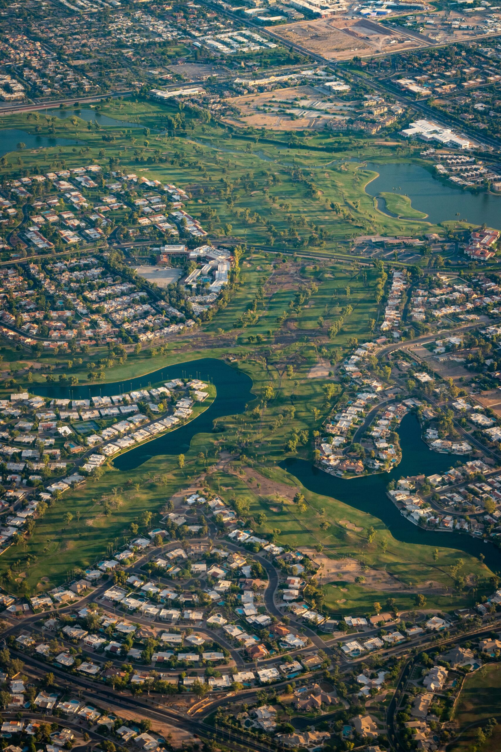 Aerial Image of Golf Community Scottsdale Arizona with lakes and homes.