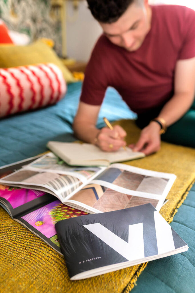 Real estate agent preparing for the home buying process in Arizona by reviewing documents and notes before touring houses
