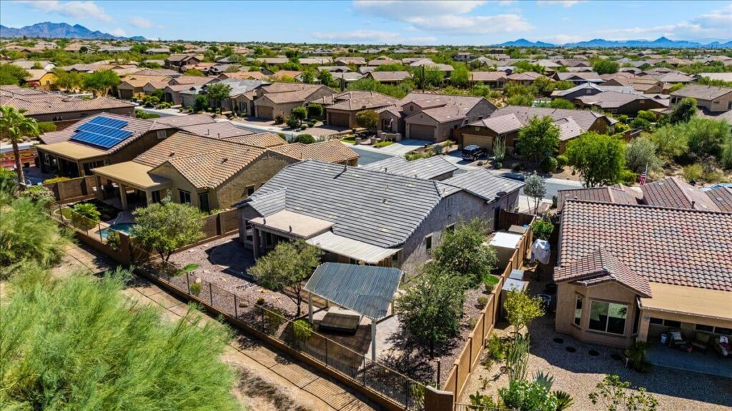 Aerial view of single-family homes in Lone Mountain community Cave Creek AZ with desert backdrop.