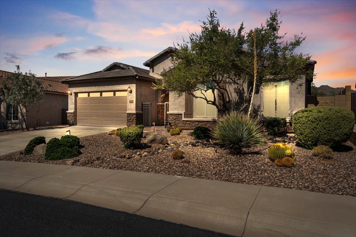 Single level desert home in Cave Creek with low maintenance landscaping, ideal for local homeowners considering downsizing.