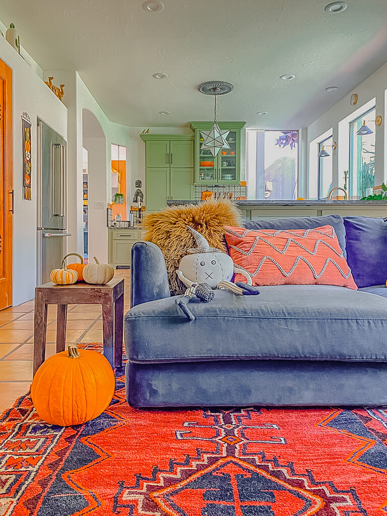 Arizona home decorated for Halloween with pumpkins, fall colors and a living room dressed for October.